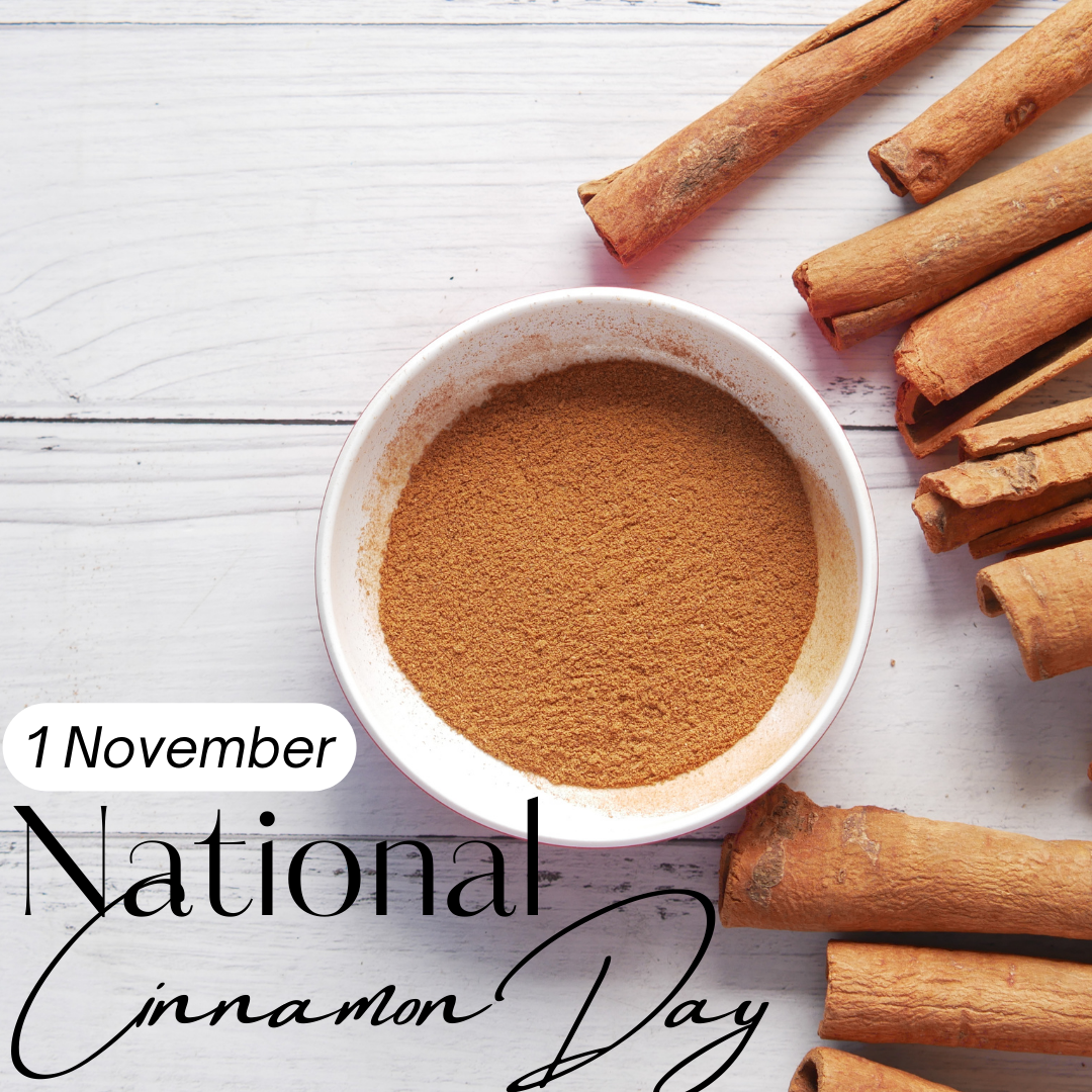 Happy National Cinnamon Day. November 1st. Ground cinnamon in bowl. Cinnamon sticks. White wood background.