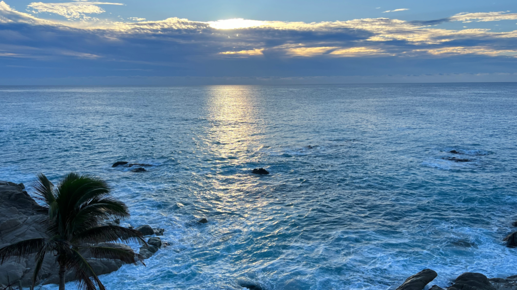 The Pacific Ocean at sunrise from Cabo San Lucas, Mexico. November 2023.